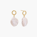 18K gold vermeil twisted circle studs with organic white baroque pearl drops on cream background