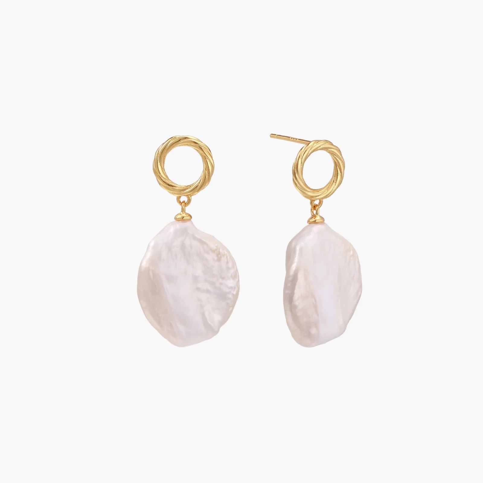 18K gold vermeil twisted circle studs with organic white baroque pearl drops on cream background