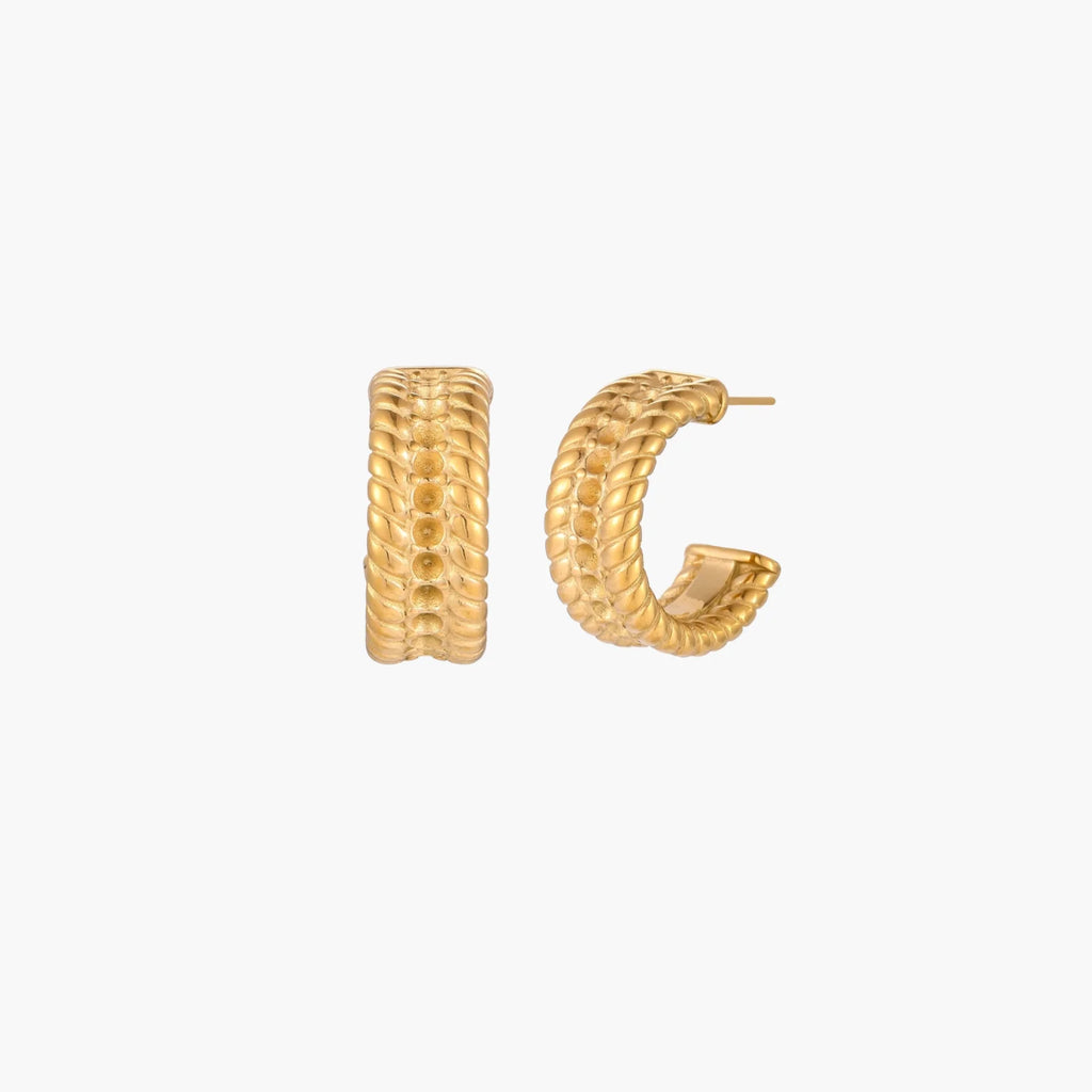 Chunky gold hoops with dimensional ridged texture and 14K plated finish shown in front and side view on cream background.