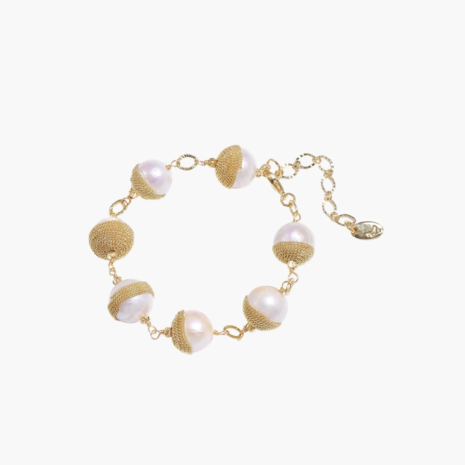 Adjustable bracelet with baroque pearls wrapped in delicate gold mesh netting connected by textured chain links