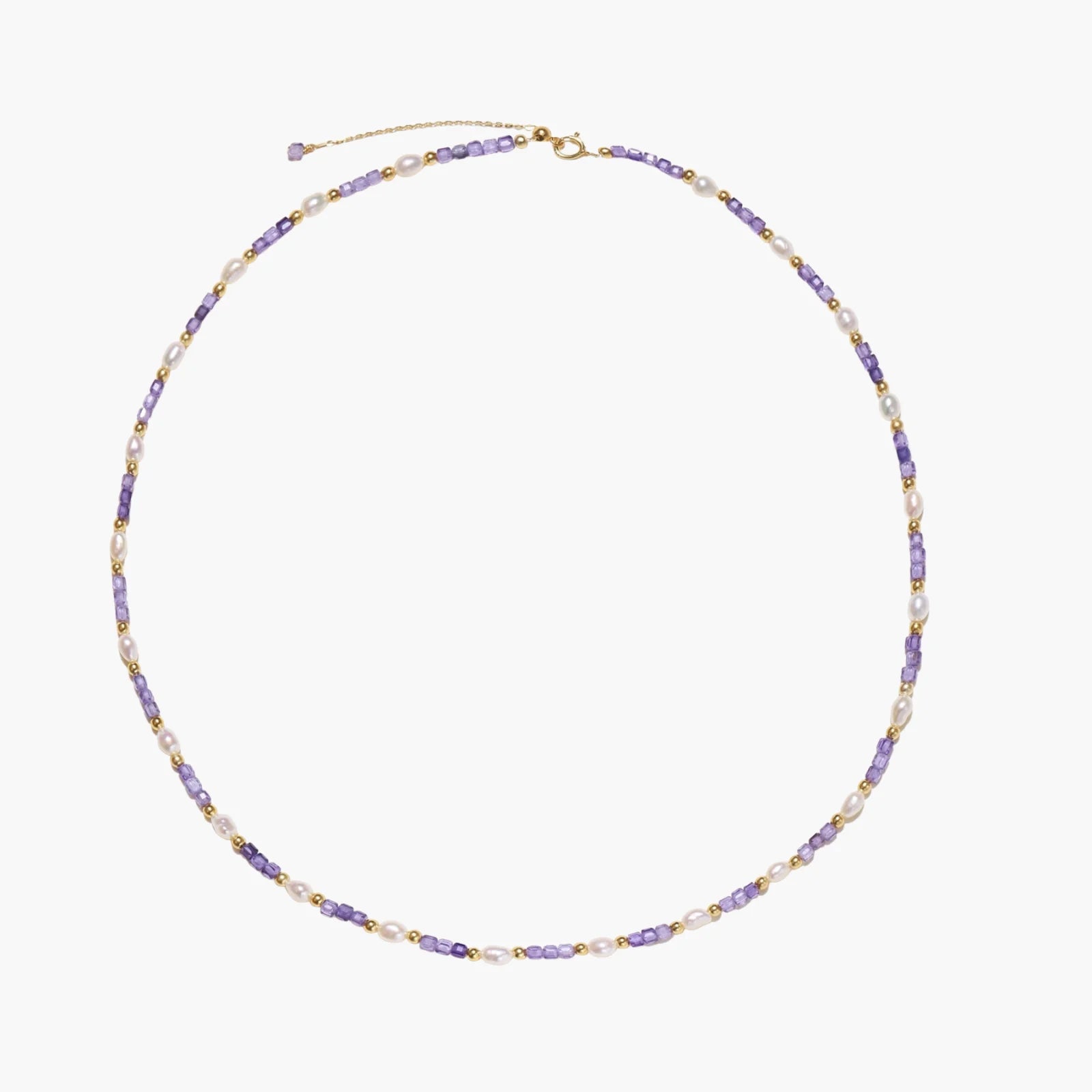 Delicate 18K gold vermeil necklace with alternating lavender zirconia beads and white freshwater pearls on cream background