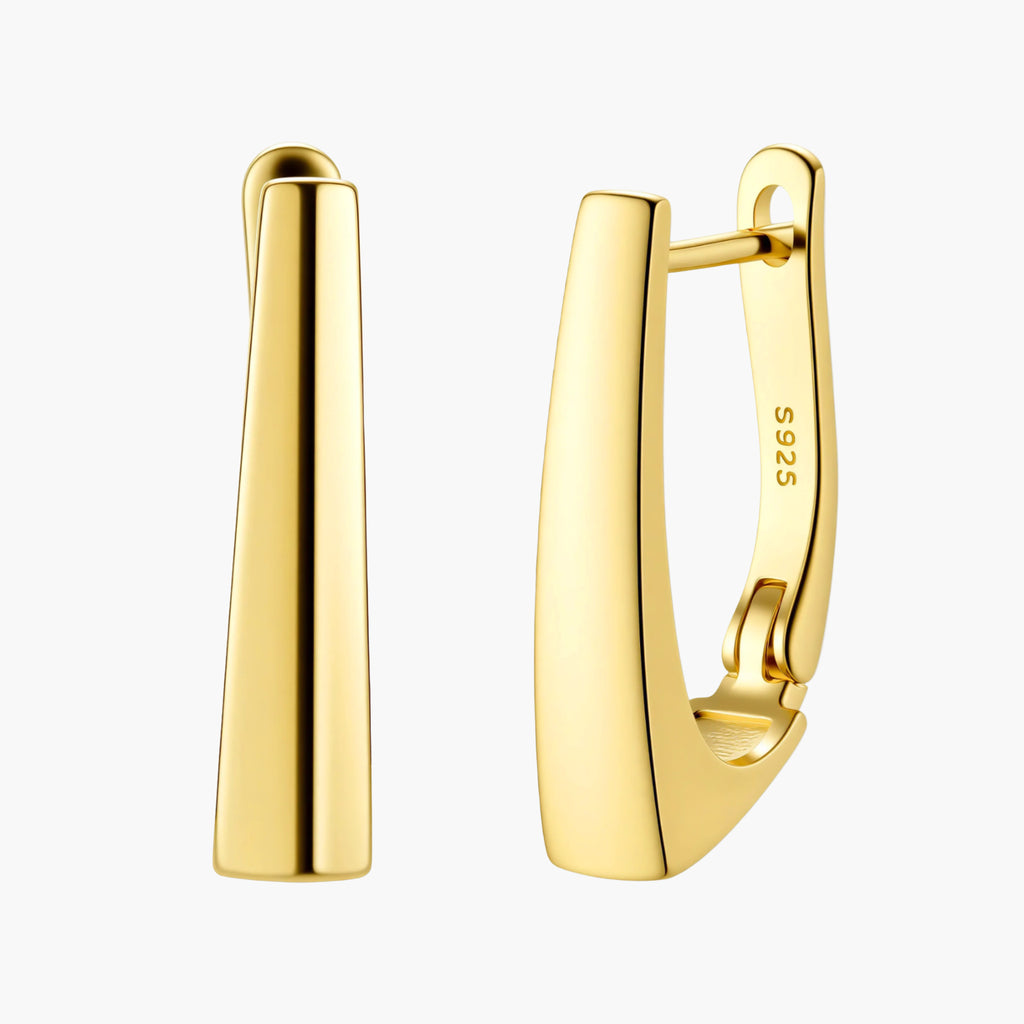 Sleek 14K gold-plated sterling silver huggie earrings with polished finish and geometric elongated design on white background.