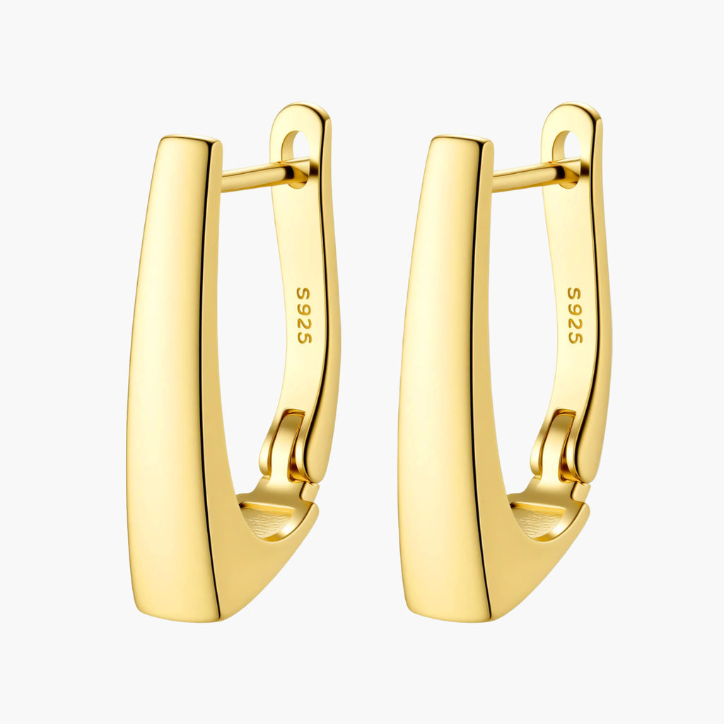 Sleek 14K gold-plated sterling silver huggie earrings with polished finish and geometric elongated design on white background.