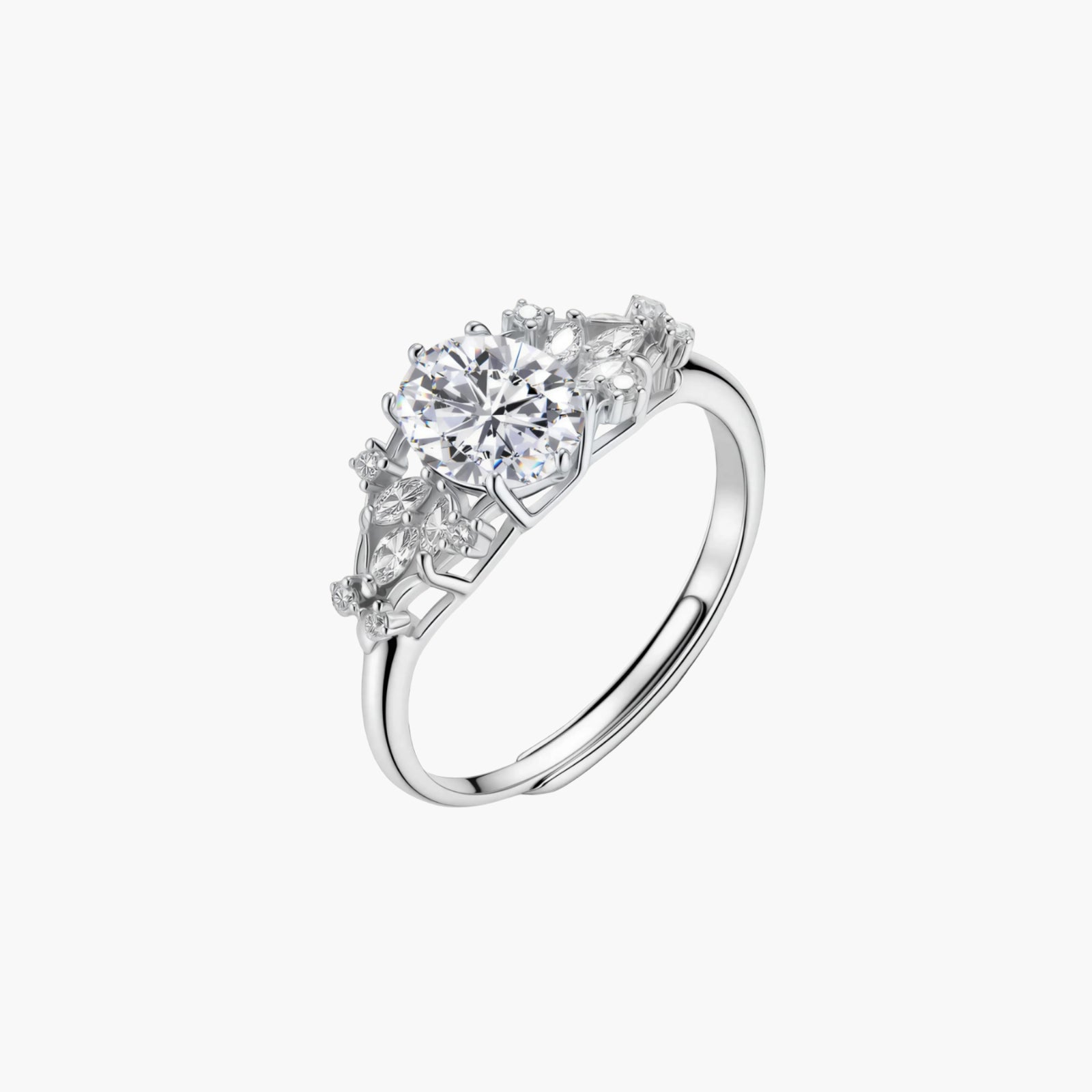 Sterling silver ring with oval moissanite center stone surrounded by smaller accent stones in ornate setting