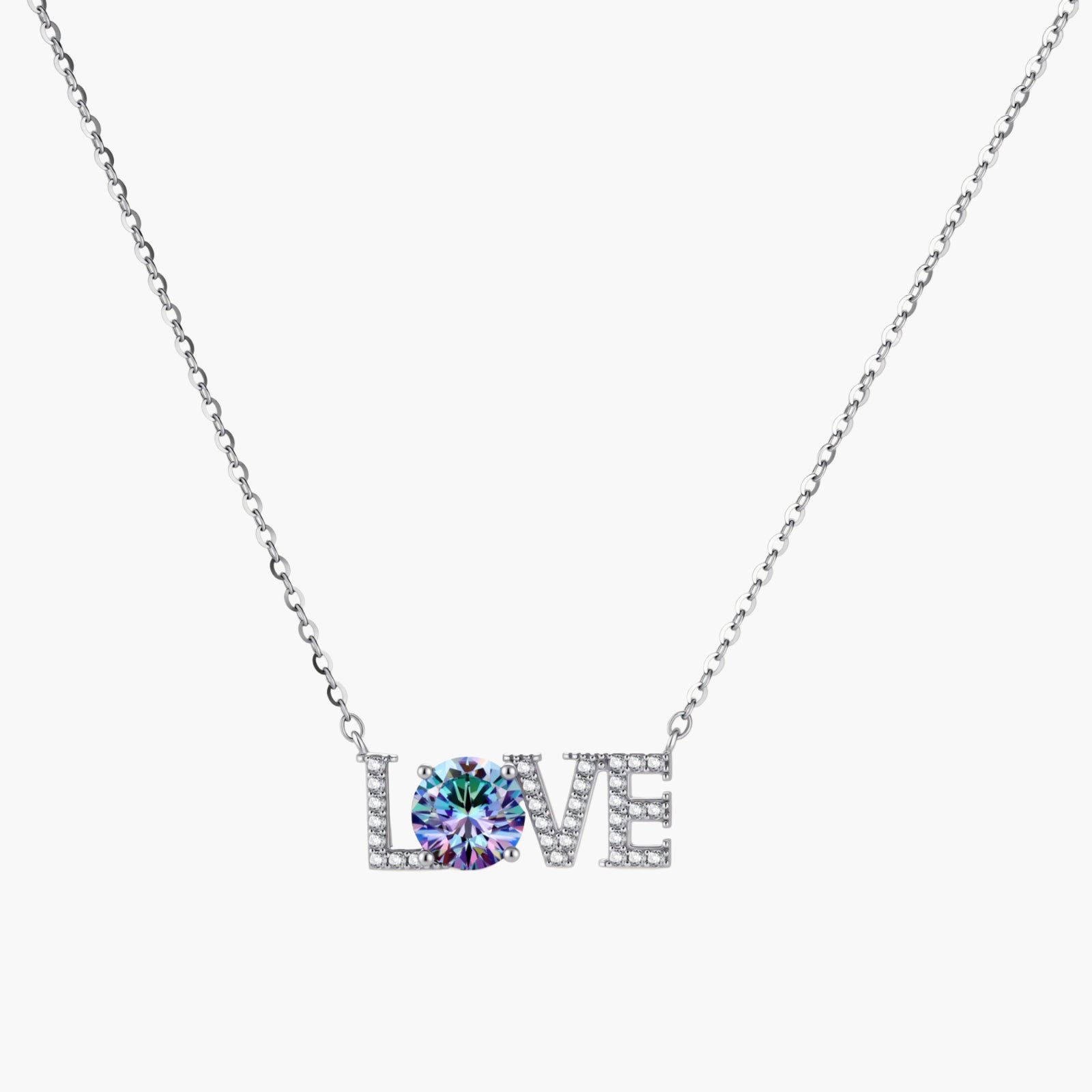 Sterling silver LOVE necklace with brilliant moissanite center stone and pavé details on neutral background.