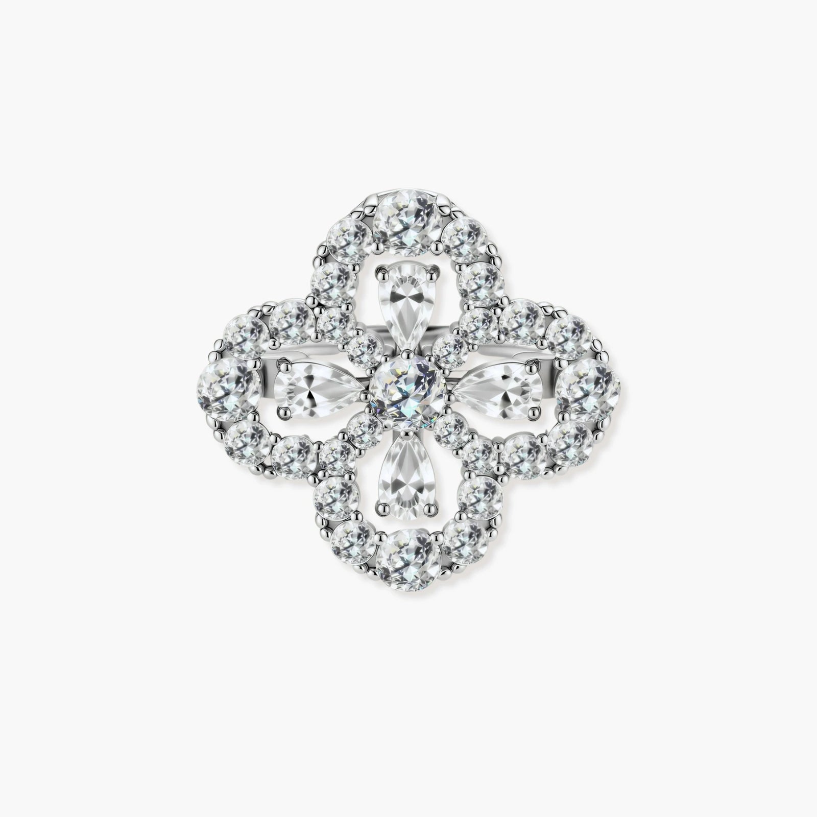 Adjustable sterling silver ring with quatrefoil design featuring brilliant moissanite stones in clover pattern