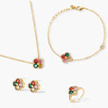 Gold-plated clover jewelry set with red, pink, green and champagne CZ stones surrounded by crystal borders