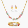 Gold-plated jewelry set with pink, turquoise and red flower-shaped cubic zirconia stones, featuring necklace, earrings and bracelet.
