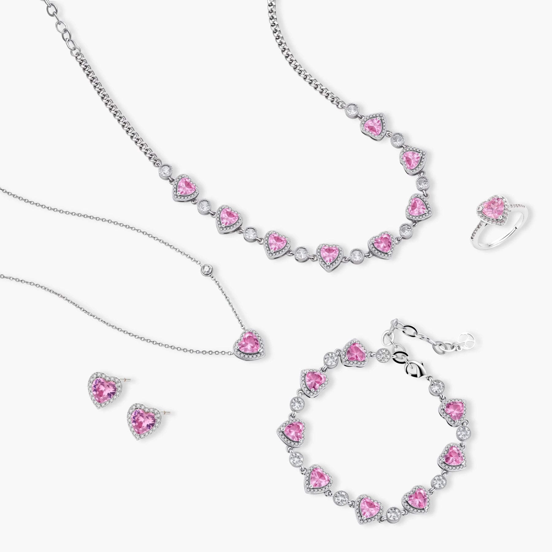 Pink heart-shaped cubic zirconia jewelry set with white gold plating featuring necklace, earrings, bracelet and ring
